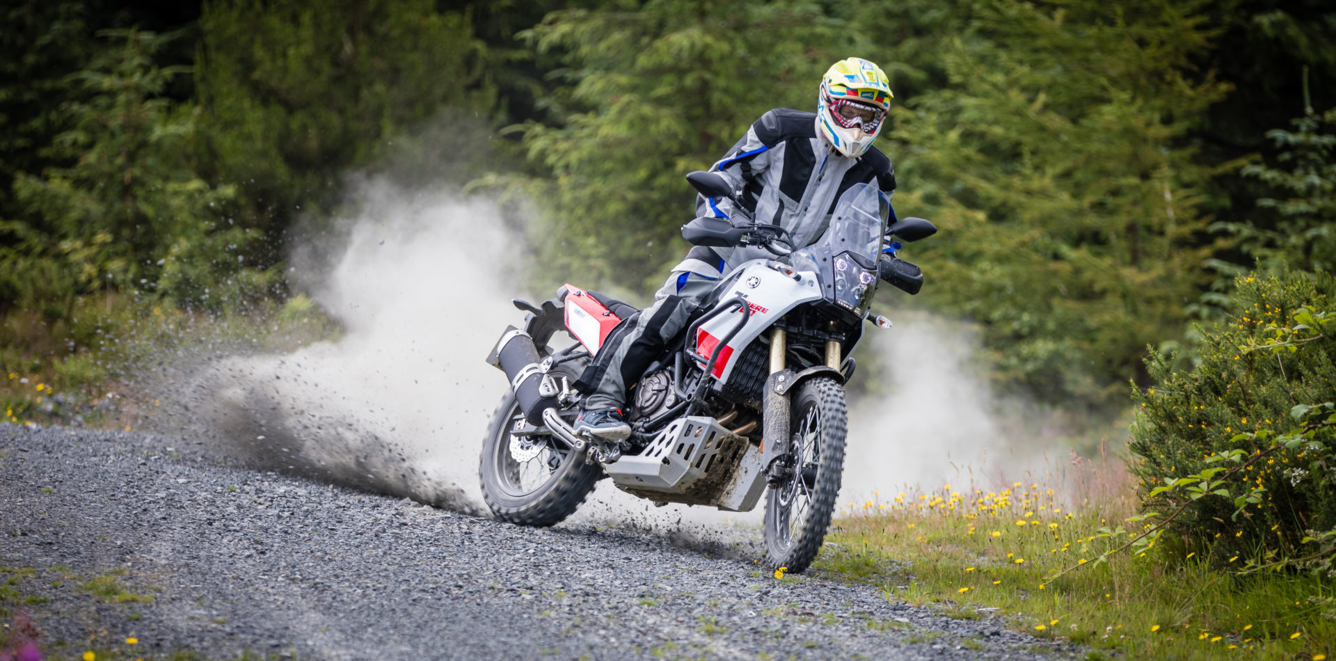 One of the Yamaha Tenere Experience instructors showing their adventure riding skills off road, power sliding the Tenere 700 on gravel.
